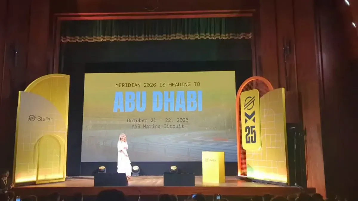 Stage of Stellar Meridian 2025, big banner detailiing Stellar´s next Meridian conference will be in Abu Dhhabi.